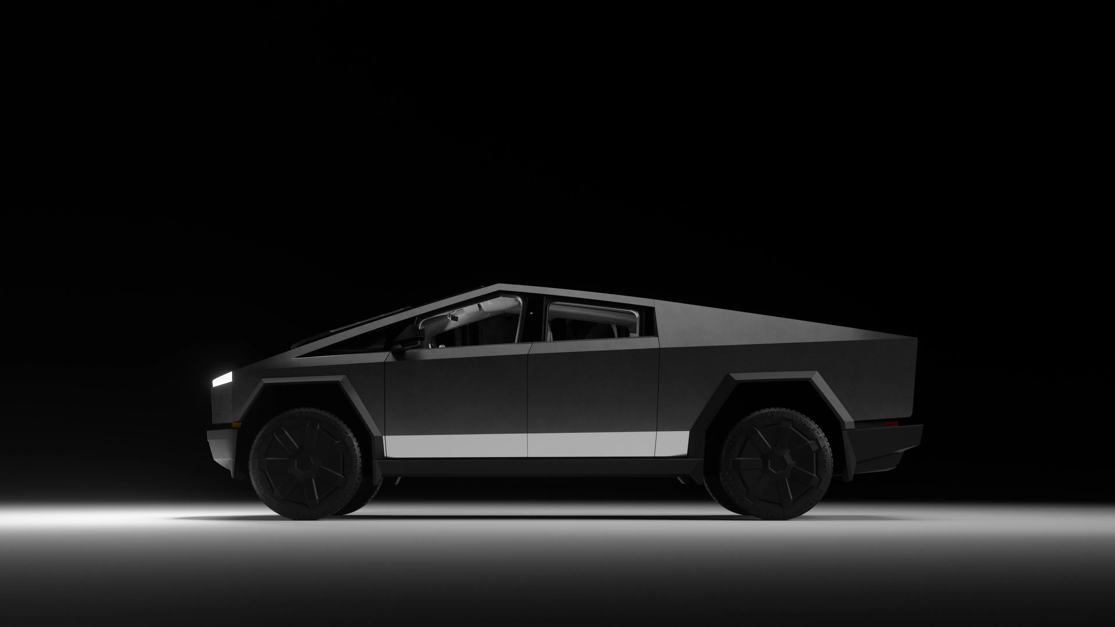 Tesla Cybertruck side profile in dark studio lighting
